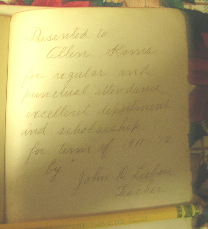 Inscription in Allen Korns' childhood book.
