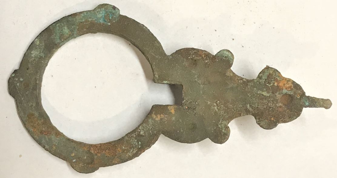 A photograph of the front of an antique rifle cap box blank that was found in a bucket of old gunsmithing hardware on a Somerset County, Pennsylvania farm.