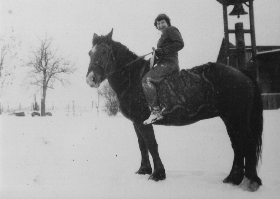 Allen Korns' daughter on horseback