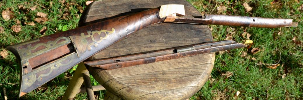 This shows the right-hand side of the stock of a wrecked muzzle loading black powder rifle that was made by Daniel Benjamin Troutman, son of the gunsmith Benjamin Franklin Troutman of Southampton Township, Somerset County, Pennsylvania.
