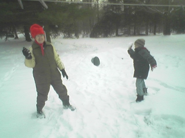 Carl and Estalene Dietle playing in the snow.