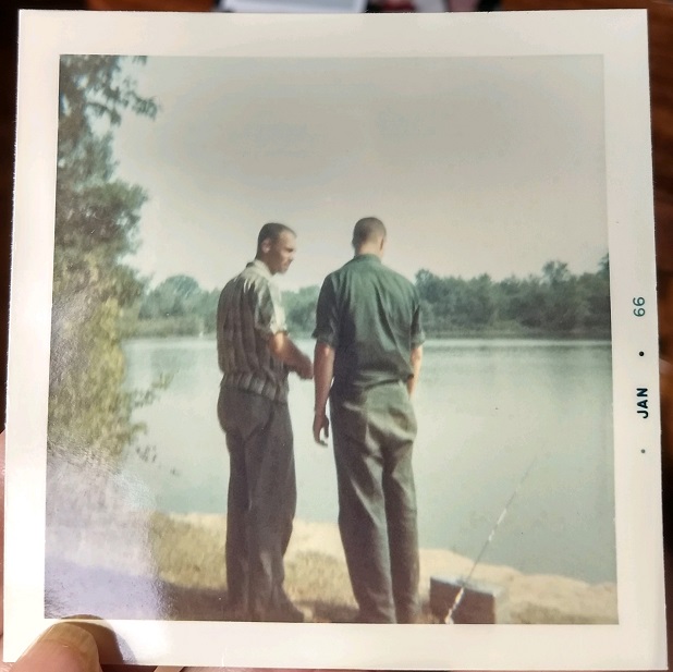 Roy Dietle and his youngest brother Ralph, fishing at a lake.