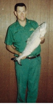 Ralph Dietle posing with a nice fish he caught during an Ontario fishing trip.
