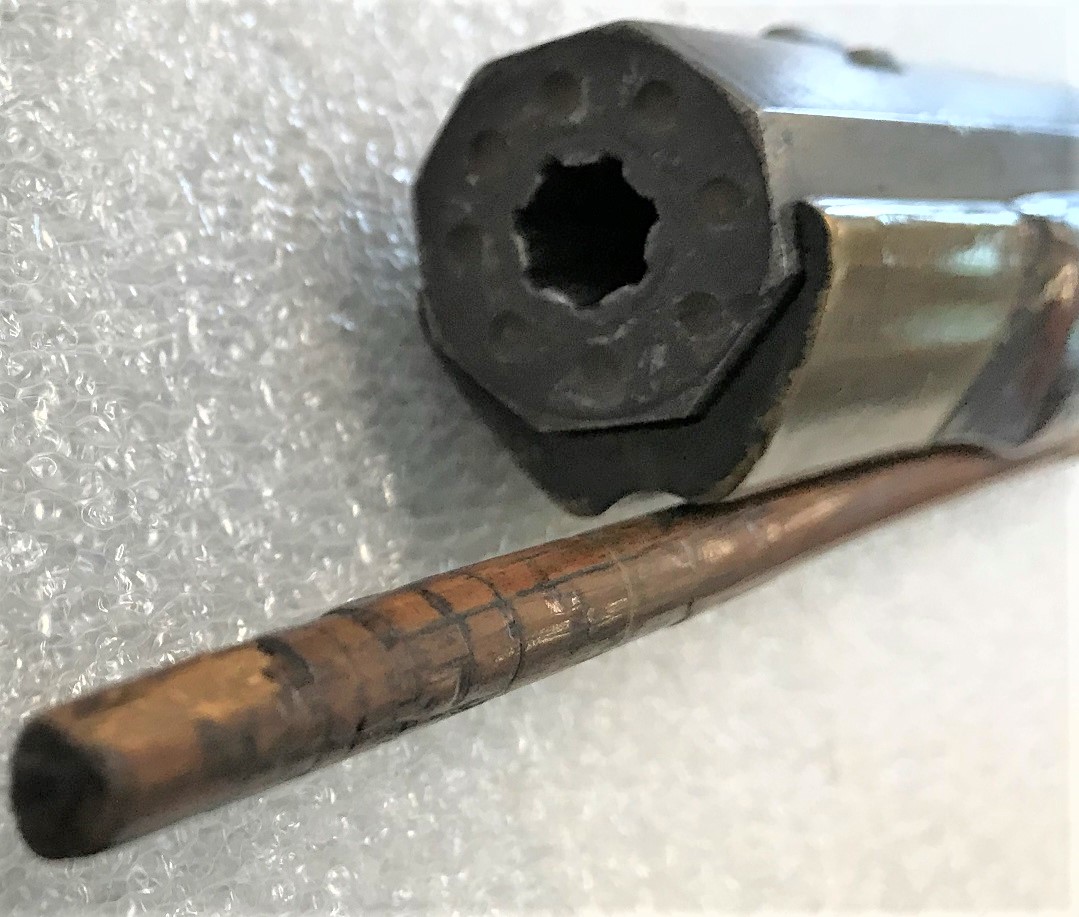 A detailed oblique view of the muzzle of a percussion rifle manufactured by the Somerset Co., PA gunsmith Charles Monroe Knupp.