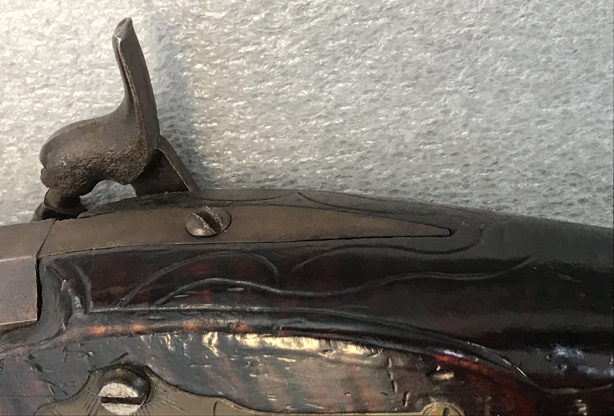 An oblique view showing the pointed tang of a Charles Monroe Knupp-made Pennsylvania long rifle.