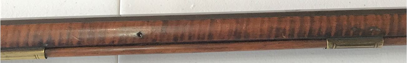 A view of the ferrules for the ramrod on the Defibaugh-made Pennsylvania long rifle.