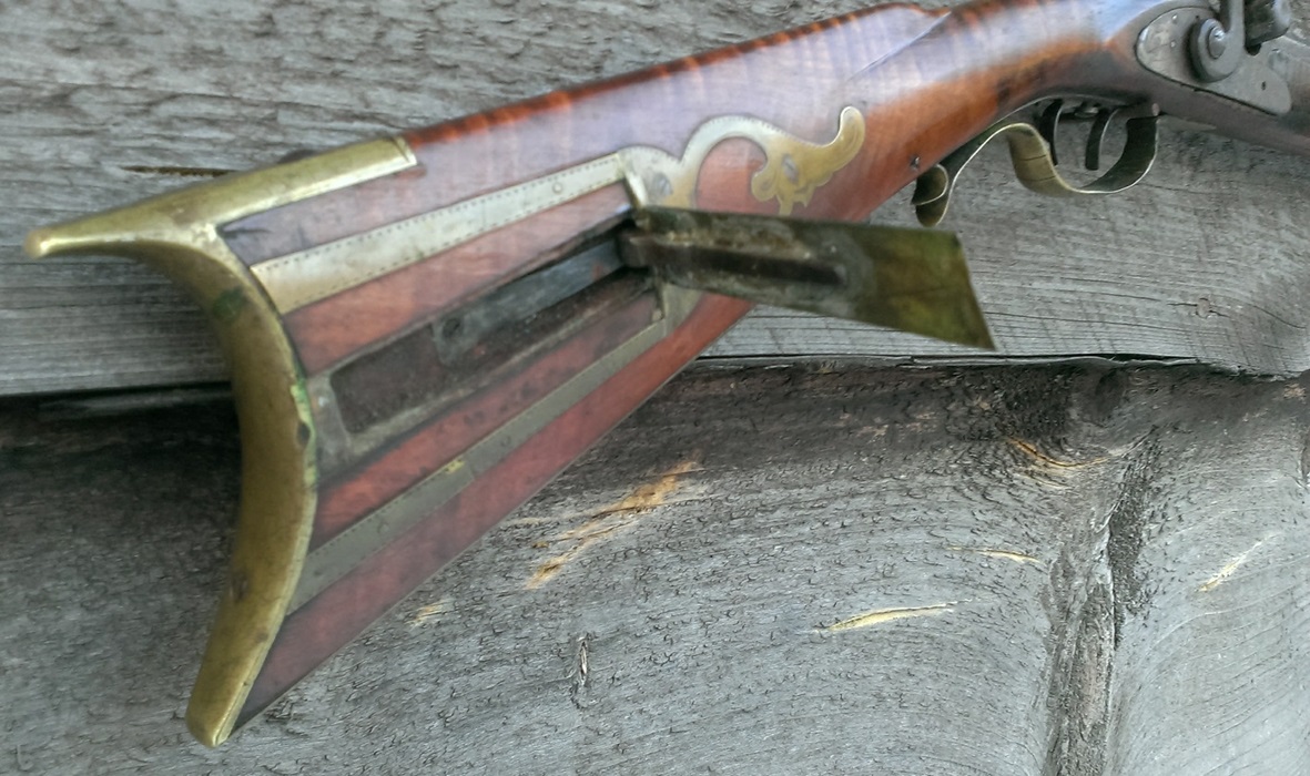 A photo of the lid of the patch box in the open position.