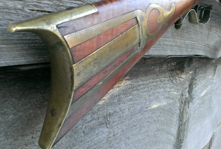 An oblique view of the crescent-shaped butt plate.