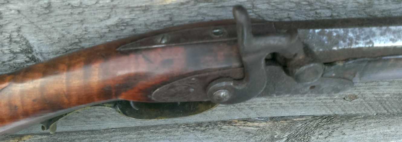 An oblique view of the pointed tang of the breech plug.