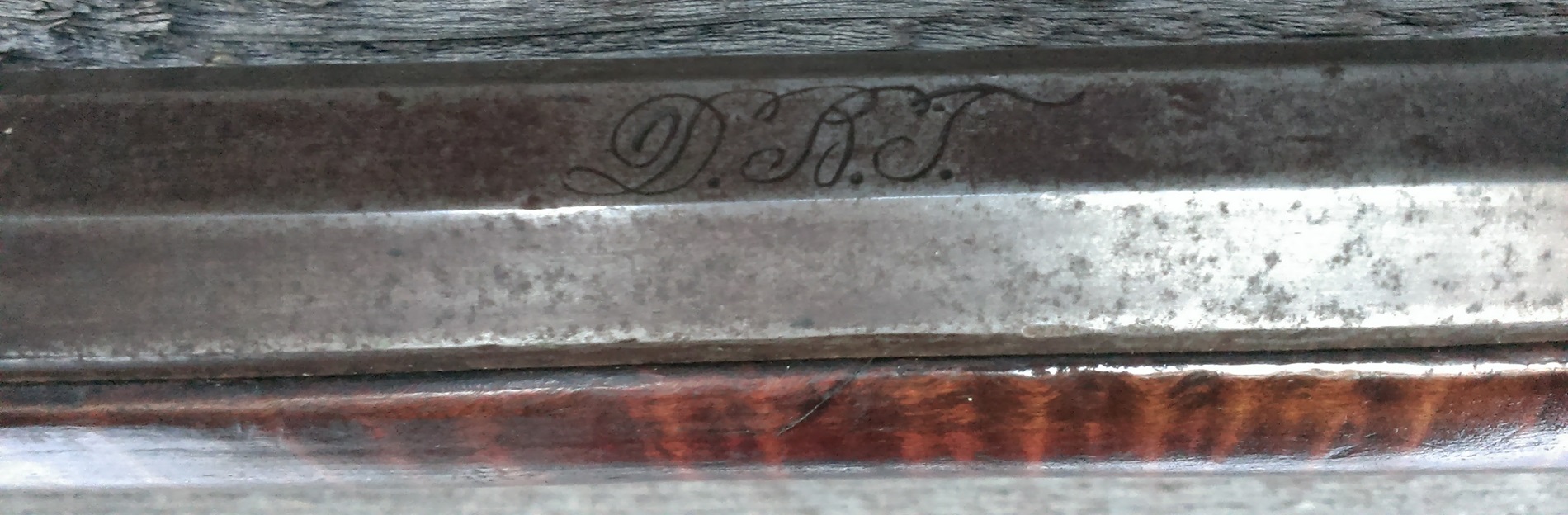 The cursive barrel inscription identifies the riflesmith who made the gun.