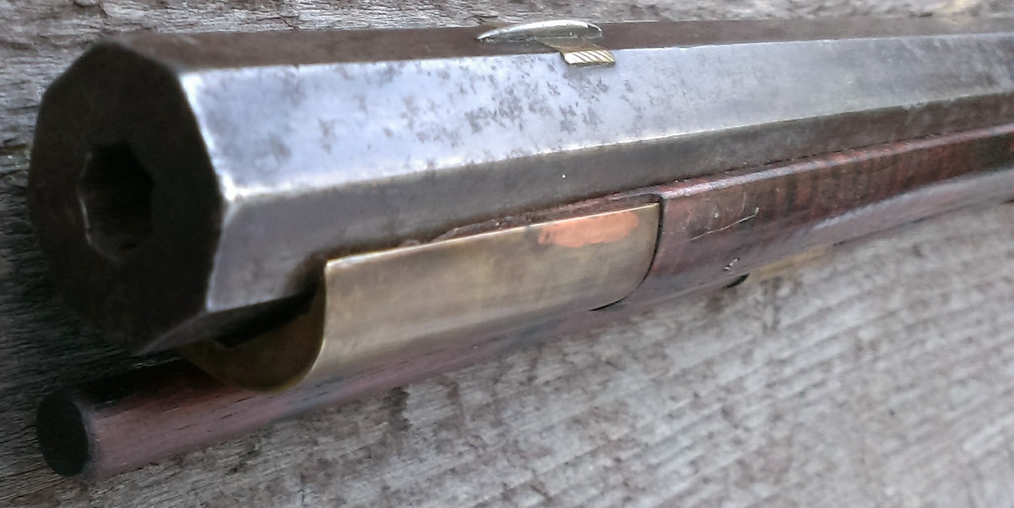 An oblique view of the front of the rifle.