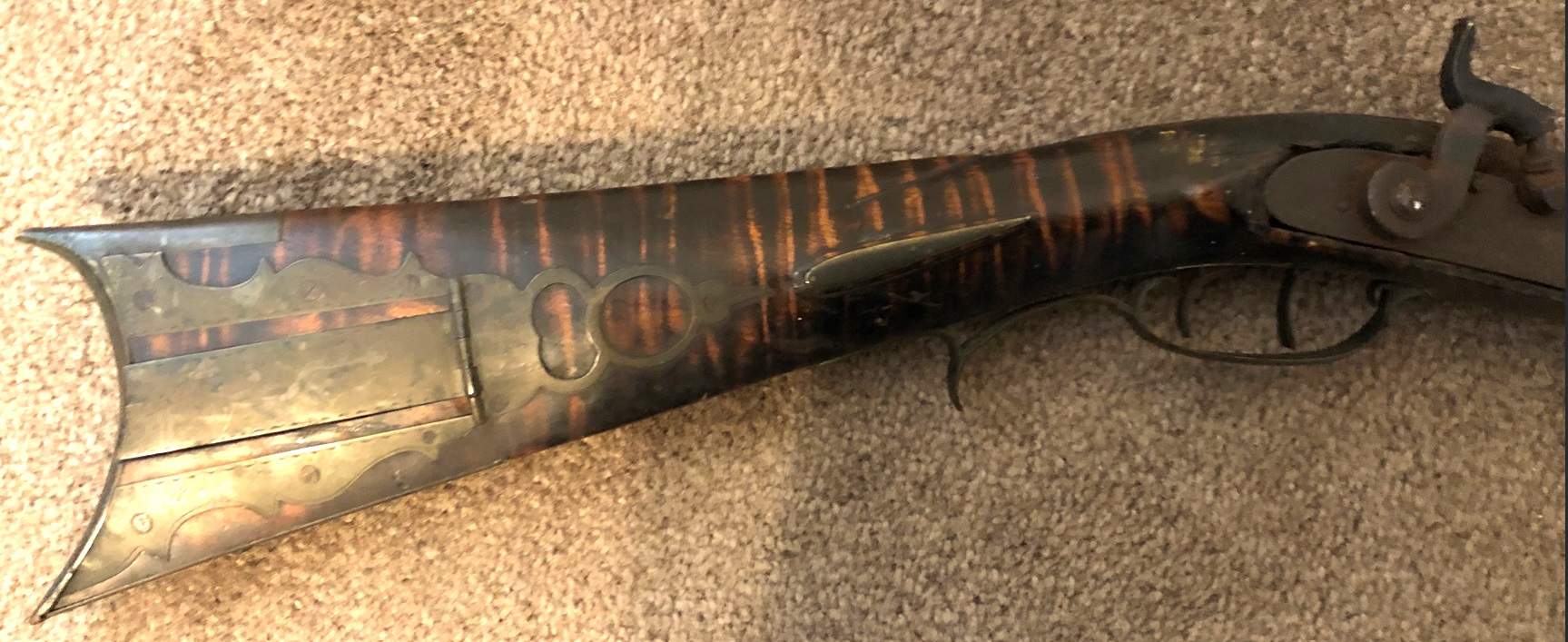 This photo highlights the right-hand side of the buttstock of the Lepley long rifle.