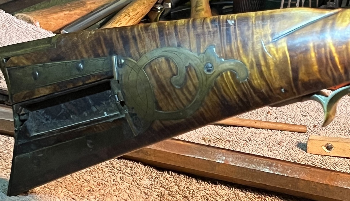 The patchbox of the John Amos rifle.