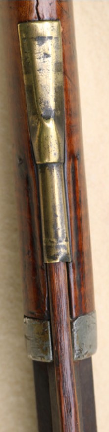 Photo of the ramrod entry pipe on the John Amos percussion rifle.