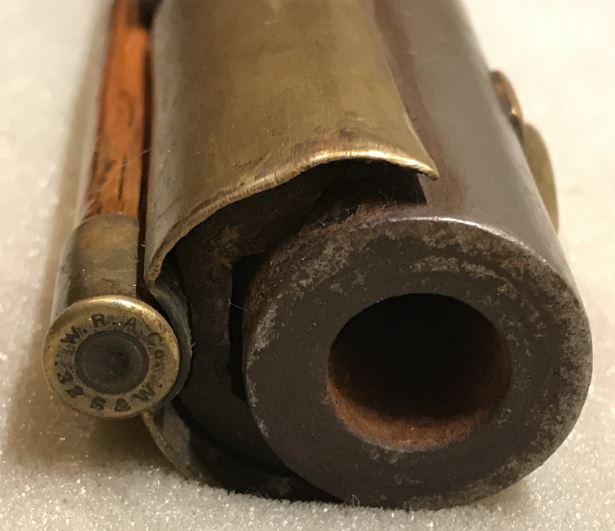 This photo shows the muzzle and the ramrod tip of the Joseph Mills smooth rifle.