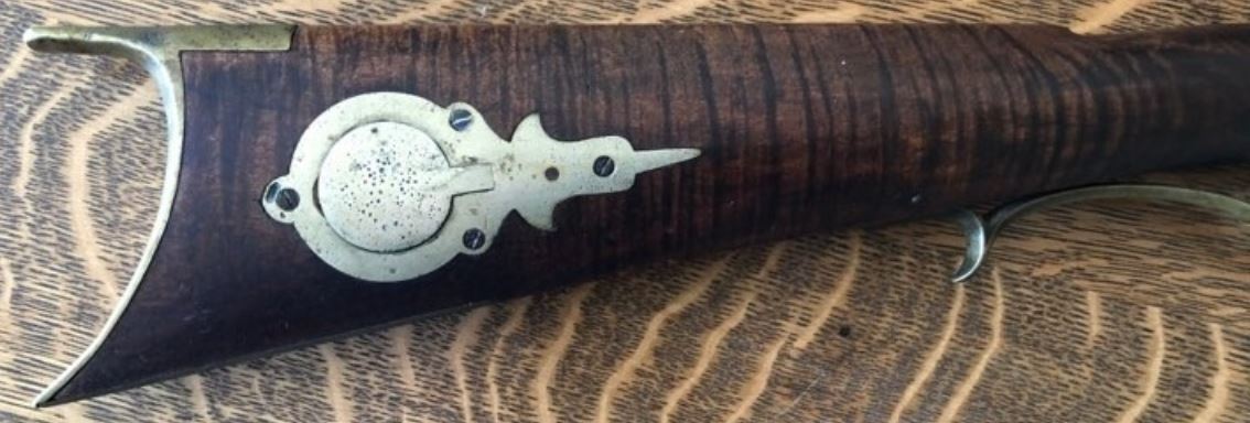 This photo shows the cap box and the butt plate of a Somerset County rifle made by the Lepley family of Southampton Township.