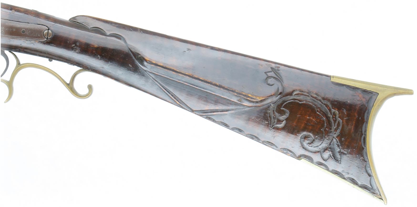 The back action gun locks on this Somerset County black powder muzzle loading rifle were made by Moore.