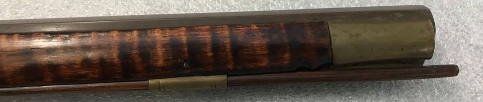 The nose cap and the forward ramrod ferrule of the unknown percussion rifle. 