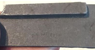 W. G. Sutter  stamping on a Bedford County, Pennsylvania-style percussion gun lock.