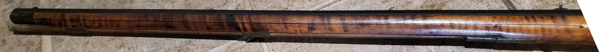 The left-hand side of the forearm.