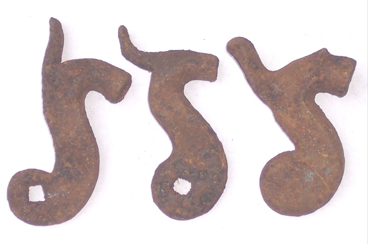 Three caplock hammers that were in a bucket gun hardware that was found on a Lepley farm in Southampton Township, Somerset County Pennsylvania.