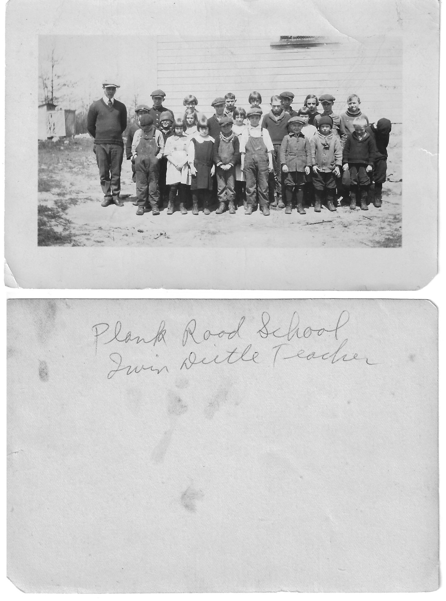 The teacher and class at the Plank Road School.